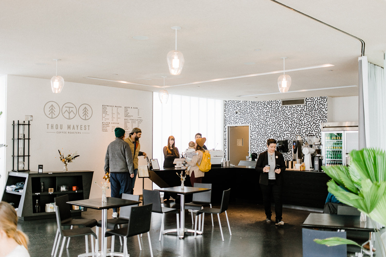 A picture of people gathered at the Thou Mayest Cafe at the Nelson Atkins Museum